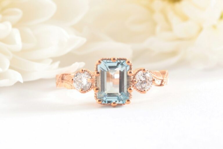 aquamarine emerald cut leaf engagement ring rose gold