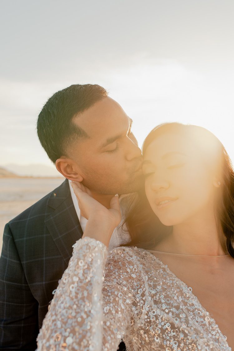 Annika Stacey Photo Co. - Couple embracing in sunbeam