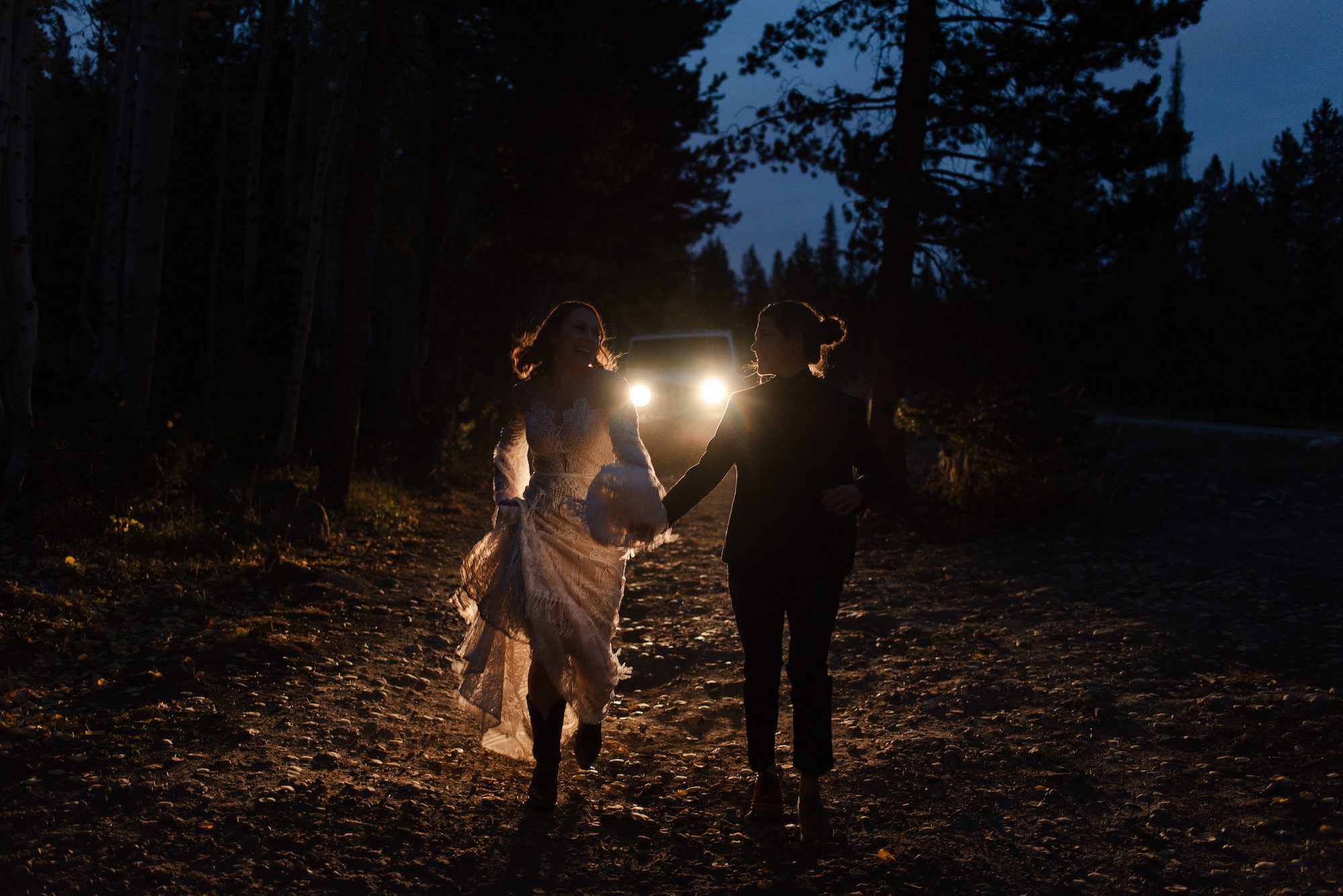 Annika Stacey Photo - Couple with headlights holding hands